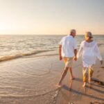 adults reviewing retirement savings plans at home by age group”