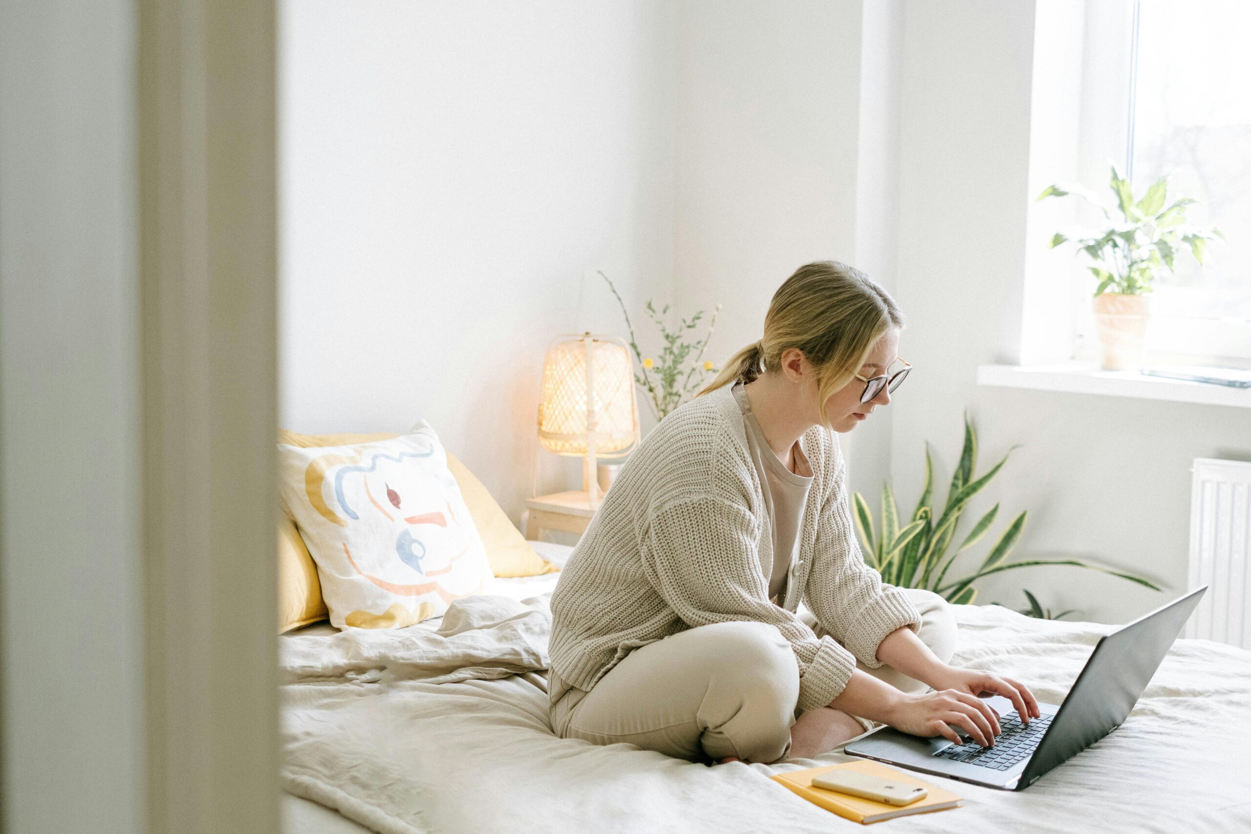 Budget planner with envelopes and calculator showing steps to stop living paycheck to paycheck