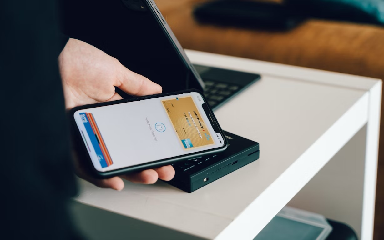 A smartphone displaying a free virtual credit card with money loaded symbolizing secure and easy online payment